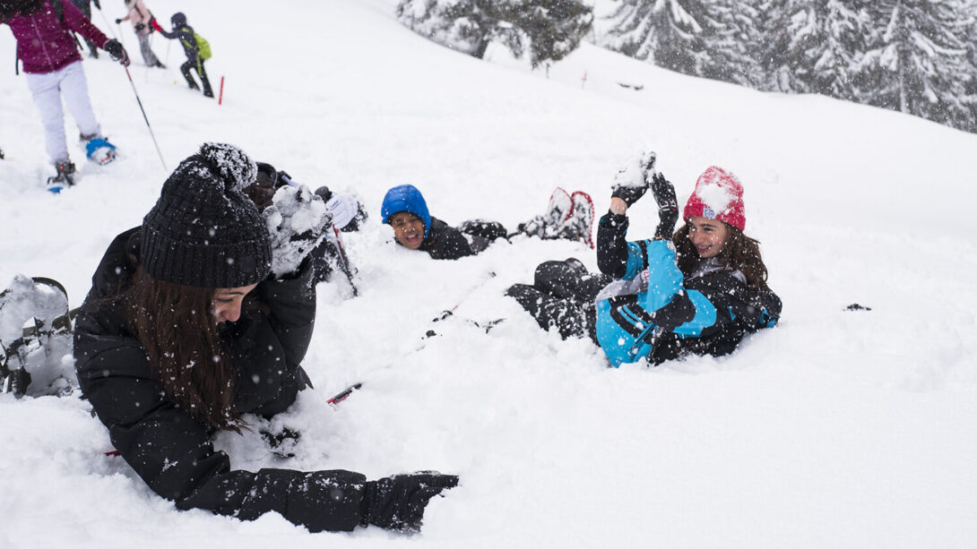 Girls playing the snow together